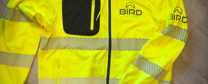 Branded safety jacket with company logo prepared by PrintX for a professional workwear project in Manchester