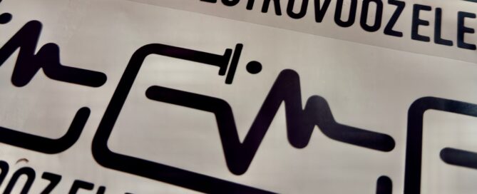 Custom vinyl logo stickers printed for Electrovooz, high quality adhesive vinyl stickers produced for business branding and equipment labelling in Birmingham, UK.